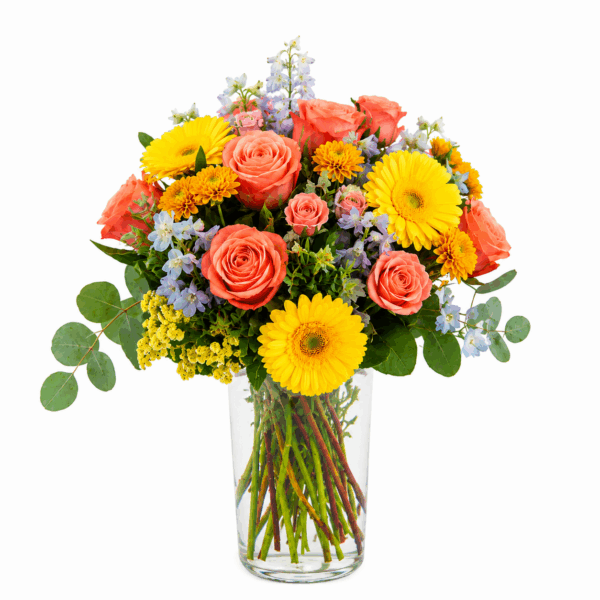 Ramo Summer Colors elaborado con flores frescas en tonos azules, amarillos, coral y naranjas, inspirado en los colores del verano. Envíos de ramos de flores a domicilio.